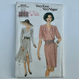 May include: A sewing pattern for a wrap dress with a V-neckline and short sleeves. The pattern is for sizes 18-20-22. The pattern is called "Very Easy Very Vogue" and the pattern number is 9005.
