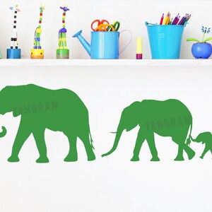Elephant family vinyl decal. Green elephant dad, mom and baby holding mom&#39;s tail. Nursery room decor. Cute kids room wall stickers
