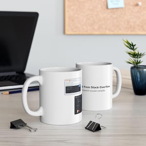 May include: Two white ceramic mugs featuring printed graphics. One mug displays a Stack Overflow browser window and code snippet. The other mug features the text: Copied from Stack Overflow. I prayed it would compile. Both mugs have a handle.