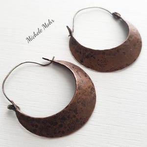 Hammered Copper Hoop Earrings with Sterling Silver Ear Wires.