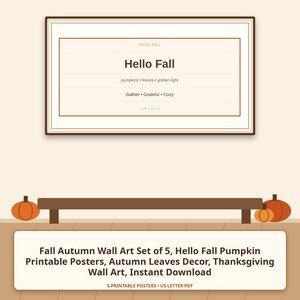 May include: A rectangular wall art print featuring the text Hello Fall, pumpkins, leaves, golden light, Gather, Grateful, and Cozy. The design is framed in brown and set against a light background with orange pumpkin illustrations at the bottom.