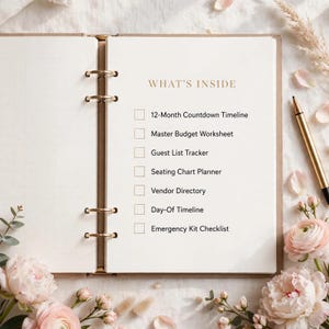 May include: An open ring-bound planner with cream-coloured pages featuring the text WHAT'S INSIDE followed by a checklist including 12-Month Countdown Timeline, Master Budget Worksheet, Guest List Tracker, Seating Chart Planner, Vendor Directory, Day-Of Timeline, and Emergency Kit Checklist.