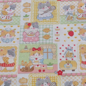 May include: A repeating pattern fabric featuring cartoon cats in a bakery setting. The cats are depicted baking and holding pastries, cakes, and bread. The color palette includes pastel pink, yellow, blue, and orange, with a white background and decorative borders.