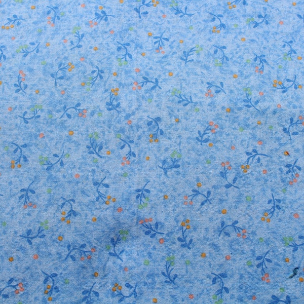 Tiny Yellow Floral Print on Blue Cotton Sewing Fabric in Small Scale