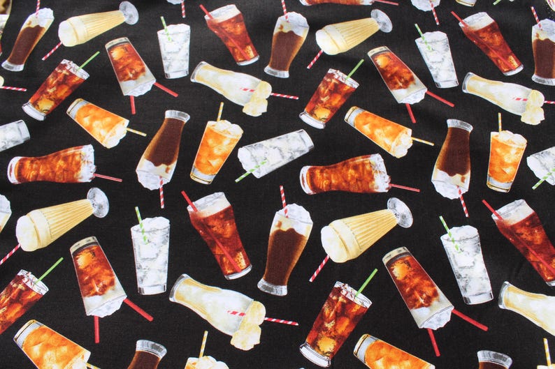 May include: Black fabric featuring a repeating pattern of cold drinks. The pattern includes iced tea, soda floats, and cocktails, each with a straw. The drinks are in clear, brown, and yellow colours.