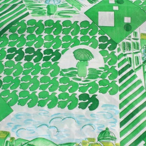 May include: White fabric with a repeating pattern of green leaf shapes, green and white striped sections, and scenes of buildings and people with umbrellas. The design incorporates green, white, and blue hues.