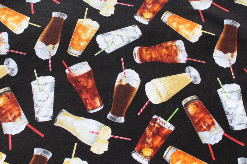 May include: Black fabric featuring a pattern of cold drinks, such as iced tea, cola, and milkshakes. The drinks are in various glasses and cups, with straws and whipped cream.