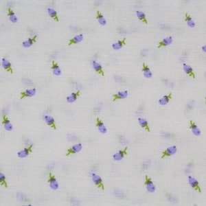 May include: White fabric with a repeating pattern of small purple flower buds with green stems. The buds are evenly spaced across the fabric, creating a delicate and floral design. The fabric has a slightly textured appearance.