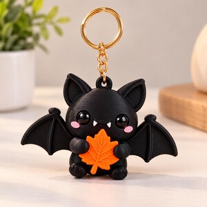 3D-geprinte vleermuis sleutelhanger, schattige Halloween tashanger, griezelig cadeau voor haar, zwarte vleermuis met herfstblad