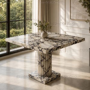 May include: A square dining table crafted from white and black veined marble, featuring a thick, flat tabletop and a central pedestal base composed of vertical fluted columns resting on a square marble base, topped with a small plant.