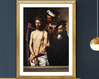 May include: A framed print of a classical painting showing a central figure with a crown of thorns, flanked by other individuals. The artwork uses a subdued colour scheme, highlighting the central figure's expression. The frame is gold.