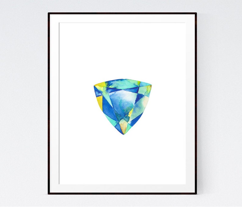 May include: A watercolor painting of a blue, green, and yellow gemstone. The gemstone is a triangular shape with a pointed tip.