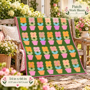 May include: A green quilt featuring a repeating pattern of potted flowers in shades of orange, pink, and yellow. The quilt displays the text Patch Work Bloom and dimensions of 54 in x 66 in, with a pink border edge.