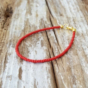 red bracelet beach wear matte finish with gold clasp image 1