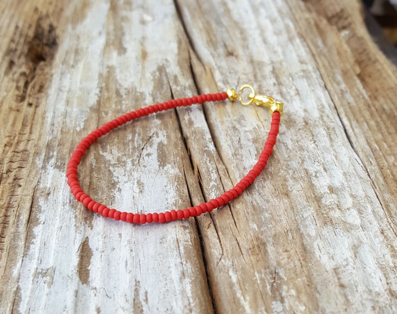 red bracelet beach wear matte finish with gold clasp image 1