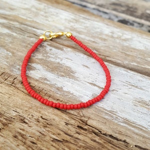 red bracelet beach wear matte finish with gold clasp image 2