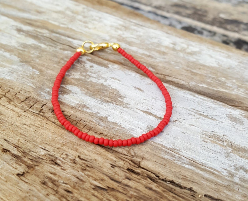 red bracelet beach wear matte finish with gold clasp image 2