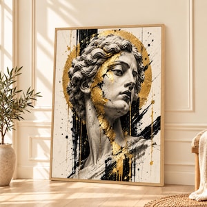 Puede incluir: Una impresión artística enmarcada que muestra un busto de mármol clásico de una persona con cabello rizado. La escultura está acentuada con detalles de pan de oro en la cara y el cuello, sobre un fondo de salpicaduras de tinta negra y un círculo dorado.