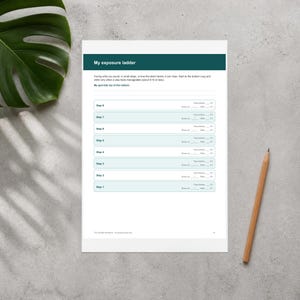 May include: A white worksheet titled My exposure ladder with a dark teal header. The page includes instructions, a goal section, and eight numbered steps with blank lines for recording fear levels before and after each task.