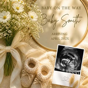 May include: A round sign with gold text reading BABY ON THE WAY Baby Smith ARRIVING APRIL 202X, accompanied by a bouquet of white cosmos and baby's breath, a pair of beige knit baby booties, and a black and white ultrasound scan print.