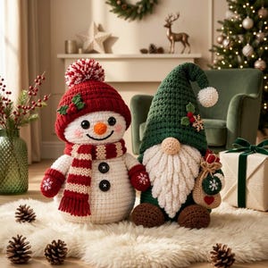 May include: A crocheted snowman wearing a red hat with a pom-pom and a matching striped scarf, standing next to a crocheted gnome in a green hat with a white beard, holding a small sack with a red heart and snowflake design.