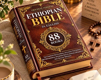May include: A hardback book titled Ethiopian Bible in English, Original Version, featuring 88 books. The brown cover has gold ornate filigree borders, a central circular emblem, and text detailing the inclusion of apocrypha, Enoch, and lost writings.