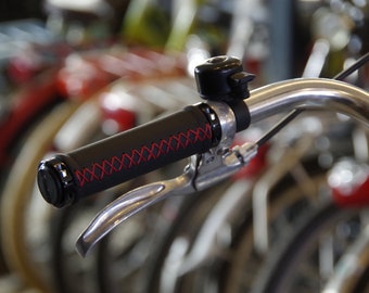 Leather Grips for Bicycle. Black with red cords.