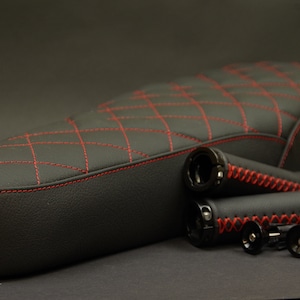 Super73 E-bike seat and Grips. Fits the SG1, S2 and RX. Black with red cords.