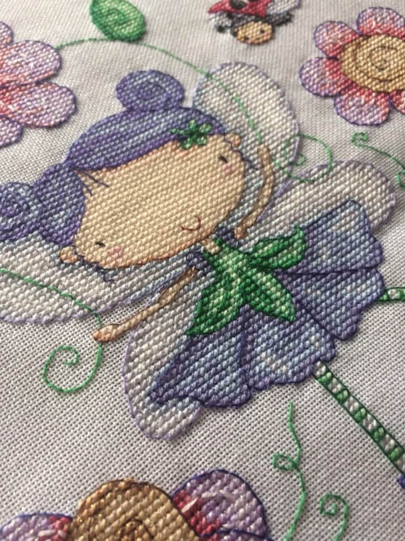 Beautiful completed Fairy cross stitch