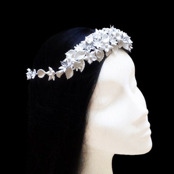 White bridal crown with porcelain flowers and leaves