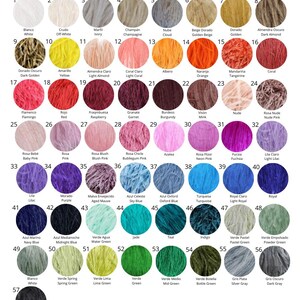 May include: A colour chart displaying 57 different shades of feathers. The colours are arranged in rows and columns, with each colour labelled in both English and Spanish. The chart is titled "Plumas. Feathers".