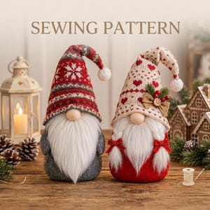 May include: Two decorative gnomes with long white beards. The left gnome wears a red and grey patterned hat with a white pom-pom. The right gnome wears a cream hat with red hearts, a burlap bow, and two white braids with red bows. Text reads SEWING PATTERN.