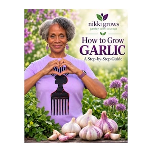 May include: A book cover titled How to Grow GARLIC A Step-by-Step Guide by nikki grows garden with courage. The cover features a person in a light purple t-shirt with a black hair pick graphic, surrounded by fresh garlic bulbs and green plants.