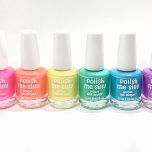 May include: Six bottles of nail polish in various bright colors, including pink, orange, yellow, green, blue, and purple. Each bottle is labeled "Polish Me Silly" with the text "unique nail lacquer" and "15mL e 0.5 fl. oz."
