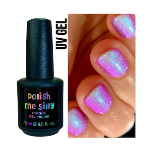 May include: A bottle of clear UV gel nail polish with a black cap and a holographic label that reads "Polish me silly" and "Unique Gel Polish". The bottle is 0.5 fl. oz. and is shown next to a hand with nails painted with a holographic pink and blue glitter polish.