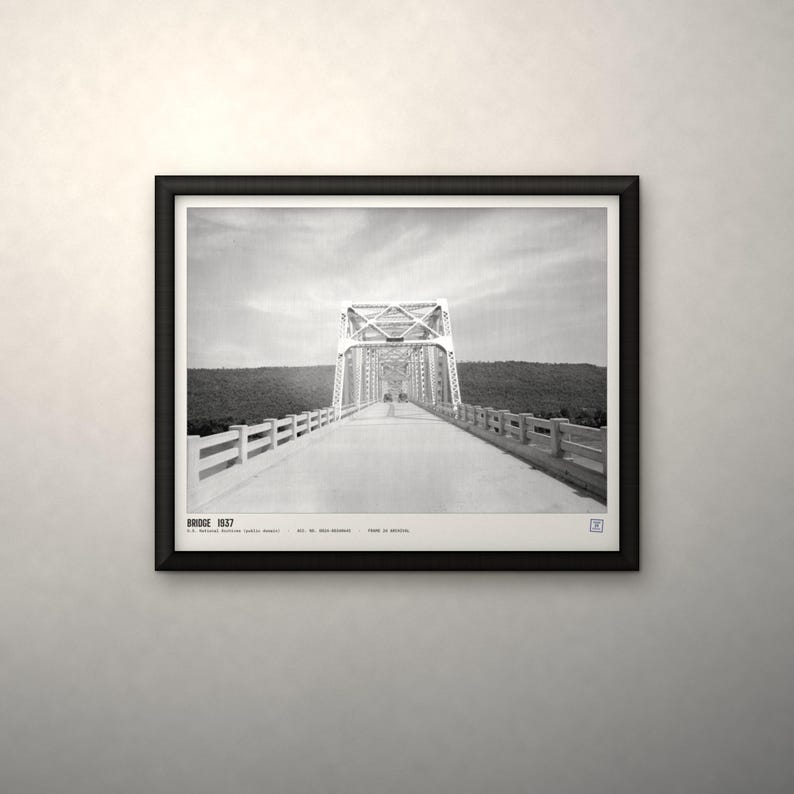 May include: A black and white framed print featuring a perspective view of a truss bridge. The text at the bottom reads BRIDGE 1937, U.S. National Archives (public domain), LOC NO. OREG-REGINALD, PRINT IS ARCHIVAL. The bridge has a metal structure and railings.