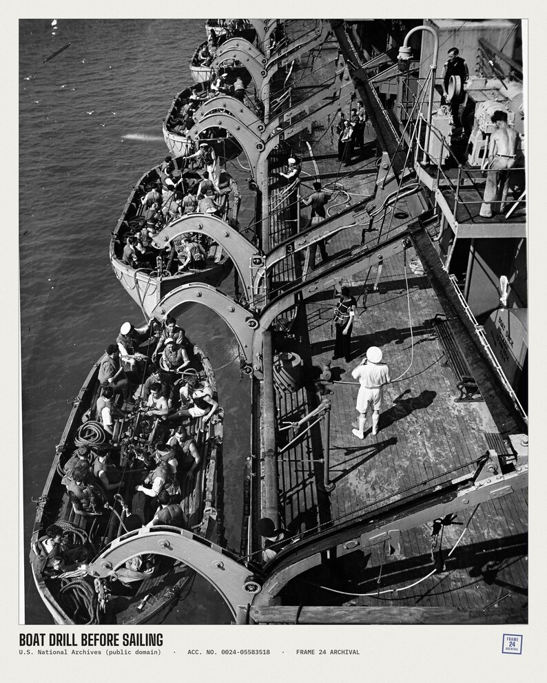 May include: A black and white photograph showing a boat drill on a ship deck with multiple lifeboats suspended by davits. Sailors are positioned in the boats and on the deck. Text at the bottom reads: BOAT DRILL BEFORE SAILING U.S. National Archives (public domain) . ACC. NO. 0024-05583518 . FRAME 24 ARCHIVAL.