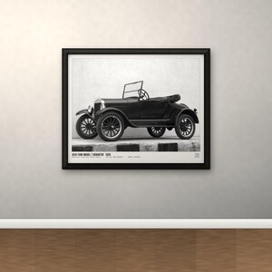 May include: A black and white framed print featuring a 1925 Ford Model T Roadster. The image shows the vintage automobile from a side profile view, with thin spoked wheels and an open top. The text 1925 FORD MODEL T ROADSTER 1925 is printed below.