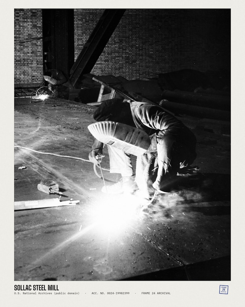 May include: A black and white photograph of a worker wearing a welding helmet and protective clothing, kneeling while welding a large metal surface. The image includes the text SOLLAC STEEL MILL, U.S. National Archives, and ACC. NO. 0024-19982399.