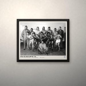 May include: A black and white framed photograph of the 1945 Norfolk Army Base boxing team. The image shows a group of men in boxing attire and military uniforms, with text at the bottom reading: BOXING TEAM, NORFOLK ARMY BASE 1945.
