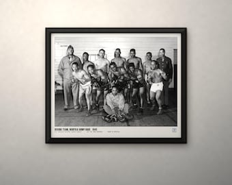 May include: A black and white framed photograph of the 1945 Norfolk Army Base boxing team. The image shows a group of men in boxing attire and military uniforms, with text at the bottom reading: BOXING TEAM, NORFOLK ARMY BASE 1945.