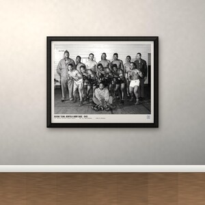 May include: A black and white framed photograph of the 1945 Norfolk Army Base boxing team. The image shows a group of athletes in boxing gear, with text at the bottom reading: BOXING TEAM, NORFOLK ARMY BASE, 1945.