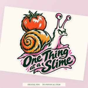 One Thing at a Slime close view showing the pink and green artwork and white outline.