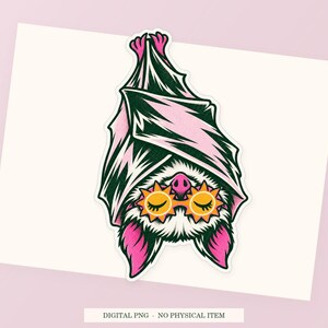 Close view of the pink and green Bat Sleep Mask illustration with its white outline on a styled background. One transparent PNG digital download.