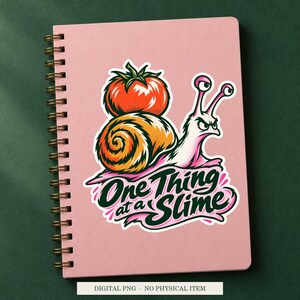 One Thing at a Slime displayed on a notebook. Digital mockup showing a creative use for the PNG.