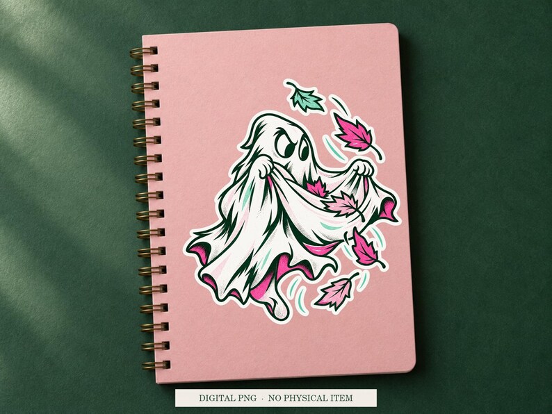 Ghost Autumn Collector artwork decorating a notebook as a white outlined sticker. Digital PNG project example; notebook and sticker are not included.