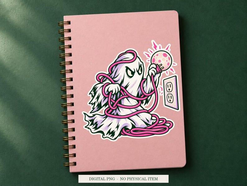 Haunted Extension Cord artwork decorating a notebook as a white outlined sticker. Digital PNG project example; notebook and sticker are not included.