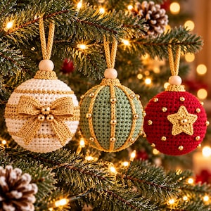 May include: Three spherical crochet ornaments hanging from a tree. The left is cream with gold stripes and a bow. The center is sage green with vertical gold cords and beads. The right is red with a gold star and scattered gold beads.