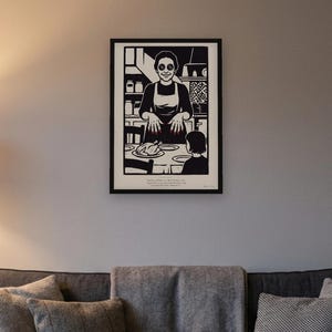 Coraline inspired art print in black woodcut style: the Other Mother with black button eyes and red fingernails smiles over a roast chicken as Coraline, seen from behind, sits at the table. Shown framed in black, white or natural oak and unframed, with the style reference and behind-the-scenes shots.