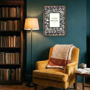 Personalised ex libris bookplate print in engraved ink on cream: a border of stacked books, a reading lamp and a cup of tea, with Ex Libris above and a mum's name and a year set in the centre.